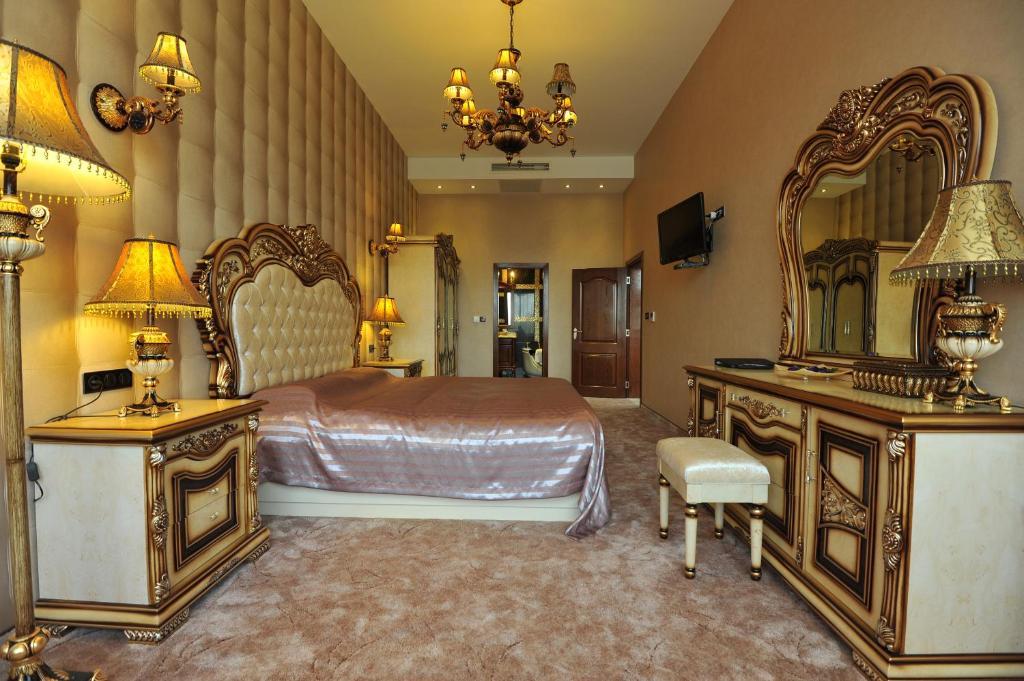 Park Hotel Stara Zagora Bilik gambar A bedroom in the hotel